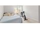Cozy bedroom with a bed, exercise bike, and ample floor space at 10023 Eventide Trl, Parrish, FL 34219