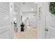 Bright entryway with tile flooring and built-in shelving at 10023 Eventide Trl, Parrish, FL 34219
