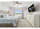 Main bedroom with lake view and plenty of natural light at 10023 Eventide Trl, Parrish, FL 34219