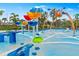 Colorful spray park with fun water features at 10023 Eventide Trl, Parrish, FL 34219