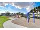 Community playground with swings, slides, and a covered area at 11139 Winthrop Lake Dr, Riverview, FL 33578