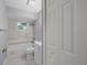 Clean bathroom with a bathtub and gray tile flooring at 11162 Libby Rd, Spring Hill, FL 34609