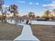 House exterior with driveway and landscaping at 11162 Libby Rd, Spring Hill, FL 34609