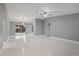 Open living area with high ceilings and marble floors at 11162 Libby Rd, Spring Hill, FL 34609