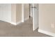 Spacious bedroom with carpet and access to other rooms at 11408 Midfield Way # 11408, Tampa, FL 33624