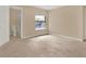 Spacious carpeted bedroom with ensuite bathroom at 11408 Midfield Way # 11408, Tampa, FL 33624