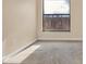 Bright bedroom with carpeted floor and large window at 11408 Midfield Way # 11408, Tampa, FL 33624
