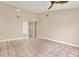 Bright living room with tile floors and ceiling fan at 11408 Midfield Way # 11408, Tampa, FL 33624
