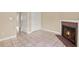 Living room featuring a fireplace and tile flooring at 11408 Midfield Way # 11408, Tampa, FL 33624