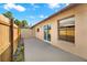 Backyard patio with wood fence and access from sliding door at 11408 Midfield Way # 11408, Tampa, FL 33624