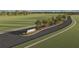 Landscaped entrance to Riverwood community at 1165 Kistna Dr, Zephyrhills, FL 33540