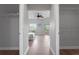 Bedroom view showing hardwood floors, window, closet, and balcony at 12033 Gandy N Blvd # 145, St Petersburg, FL 33702