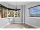 Bright living space featuring custom window coverings and beautiful views of the community landscaping at 12033 Gandy N Blvd # 145, St Petersburg, FL 33702