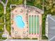 Overhead view of community pool and shuffleboard courts at 1235 S Highland Ave # 3-303, Clearwater, FL 33756