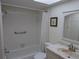 Bathroom with tub, shower, and updated vanity at 1235 S Highland Ave # 3-303, Clearwater, FL 33756