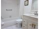 Clean bathroom with tub, shower, and vanity with marble top at 1235 S Highland Ave # 3-303, Clearwater, FL 33756