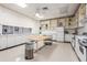 Community kitchen with ample counter space at 1235 S Highland Ave # 3-303, Clearwater, FL 33756