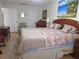 Large main bedroom with king-size bed and ample floor space at 1235 S Highland Ave # 3-303, Clearwater, FL 33756