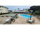 Enjoy resort-style living with this community pool and shuffleboard at 1235 S Highland Ave # 3-303, Clearwater, FL 33756