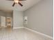 Neutral bedroom with tile flooring and an ensuite bathroom at 170 Greenhaven Cir, Oldsmar, FL 34677