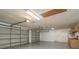 Two-car garage with storage and work bench at 170 Greenhaven Cir, Oldsmar, FL 34677