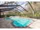 Sparkling pool and spa in a screened enclosure at 170 Greenhaven Cir, Oldsmar, FL 34677