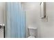 Simple bathroom with shower and toilet at 2333 Tahitian Dr, Holiday, FL 34691