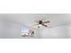 Bedroom with window, closet, and ceiling fan at 2333 Tahitian Dr, Holiday, FL 34691