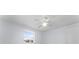 Bright bedroom with ceiling fan and window at 2333 Tahitian Dr, Holiday, FL 34691