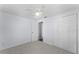 Bright bedroom with ceiling fan and closet at 2333 Tahitian Dr, Holiday, FL 34691
