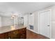 Kitchen island with view into adjacent dining area at 2333 Tahitian Dr, Holiday, FL 34691