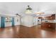 Open concept living room and kitchen with hardwood floors at 2333 Tahitian Dr, Holiday, FL 34691