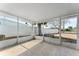 Screened porch with concrete flooring at 2333 Tahitian Dr, Holiday, FL 34691