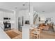 Modern kitchen with white cabinets and breakfast bar at 2445 Silvermoss Dr, Wesley Chapel, FL 33544