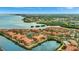 Scenic aerial view of the vibrant residential community nestled along the tranquil waters at 2722 Via Tivoli # 432B, Clearwater, FL 33764