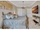 Stylish bedroom features decorative lighting and marble flooring at 2722 Via Tivoli # 432B, Clearwater, FL 33764