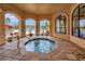 Community amenities include a hot tub, pool, and lounging area at 2722 Via Tivoli # 432B, Clearwater, FL 33764