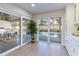 View of the pool from the kitchen at 2940 Hadleigh Ct, Clearwater, FL 33761