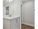 Modern bathroom vanity with single sink and updated fixtures at 3024 W Cass St, Tampa, FL 33609