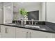 Modern bathroom vanity with double sinks and sleek countertops at 3024 W Cass St, Tampa, FL 33609