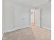 Spacious bedroom with neutral walls and plush carpeting at 3024 W Cass St, Tampa, FL 33609