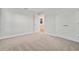 Spacious bedroom with neutral walls and plush carpeting at 3024 W Cass St, Tampa, FL 33609