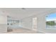 Spacious loft bedroom with multiple windows at 3024 W Cass St, Tampa, FL 33609