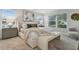 Spacious bedroom with large windows and soft carpeting at 3024 W Cass St, Tampa, FL 33609