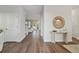 Bright and spacious entryway with hardwood floors and decorative accents at 3024 W Cass St, Tampa, FL 33609
