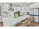 Modern kitchen with white cabinets and island at 3024 W Cass St, Tampa, FL 33609