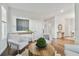 Cozy living room featuring hardwood floors and comfy seating at 3024 W Cass St, Tampa, FL 33609