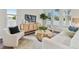 Spacious living room with ample natural light and stylish furniture at 3024 W Cass St, Tampa, FL 33609