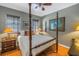 Bedroom with hardwood floors and post bed at 314 33Rd Ne Ave, St Petersburg, FL 33704