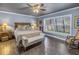 Main bedroom with king-size bed and sitting area at 314 33Rd Ne Ave, St Petersburg, FL 33704